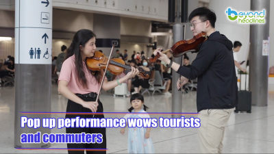 Pop up performance wows tourists and commuters